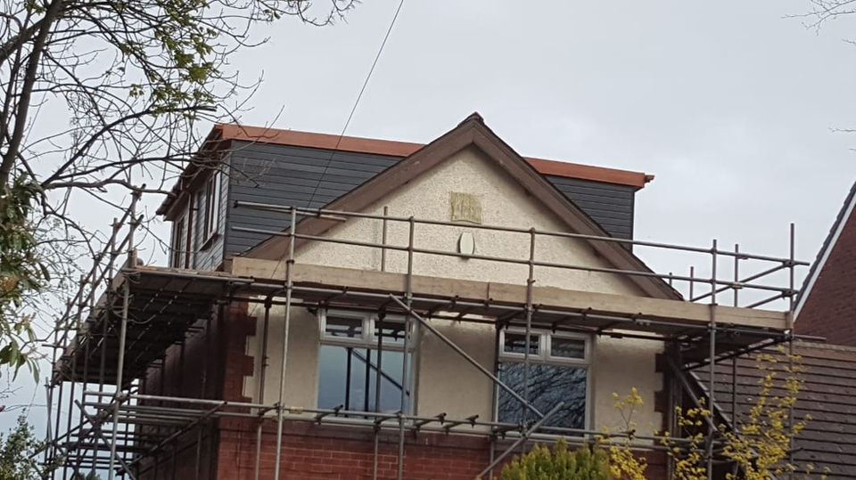 Dormer loft behind gabled property end