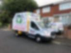 Bells Waste Disposal vehicles parked near property