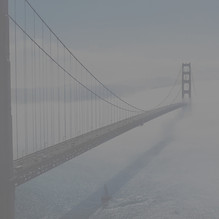 Long bridge fading into fog