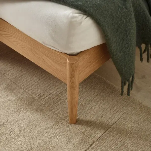 Thumbnail: Close-up of the Shelton Oak Spindle Bed frame and leg.