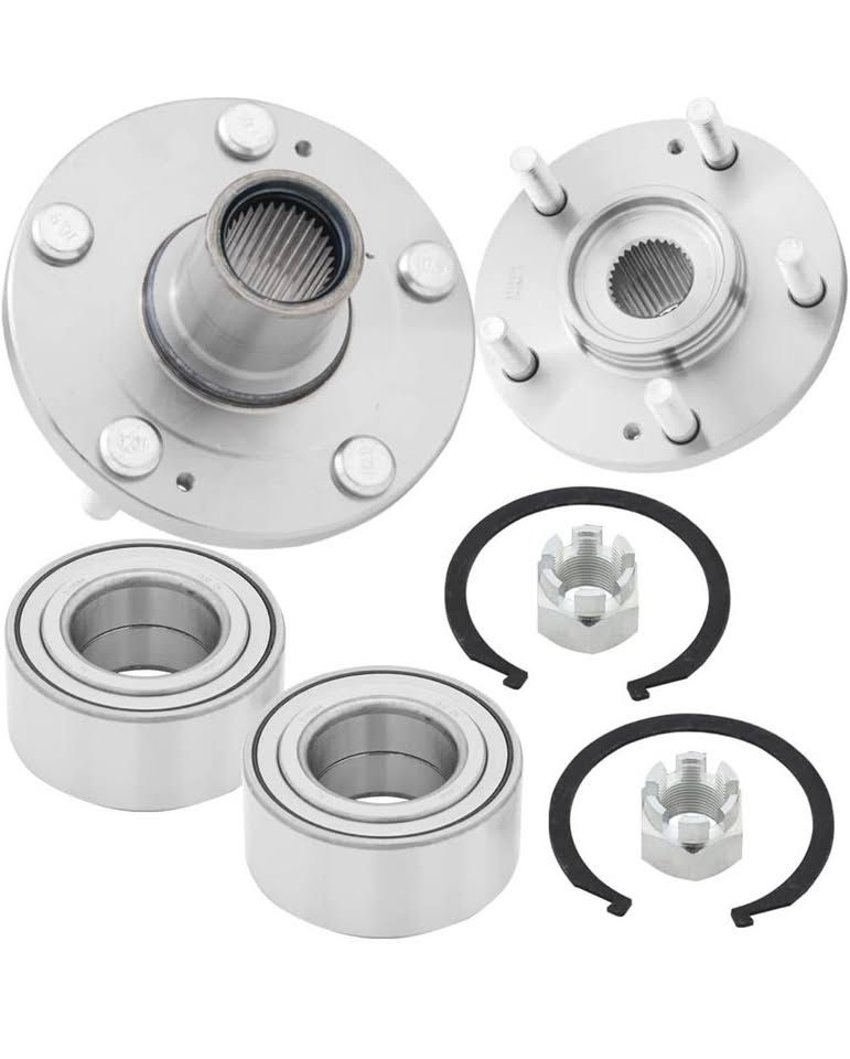 Car wheel hub assembly parts with bearings and retaining rings close up