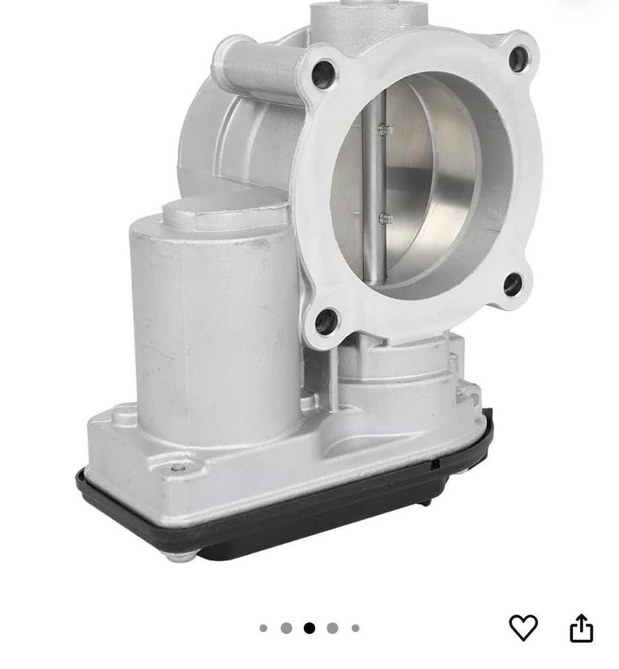Silver automotive throttle body, new part for engine repair or replacement.