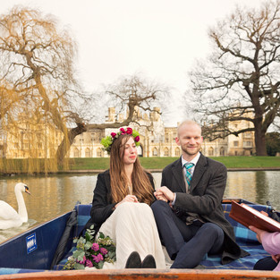 A celebrant leading an intimate ceremony on a Cambridge punt ride