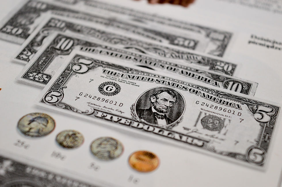 page with different increments of bills and coins