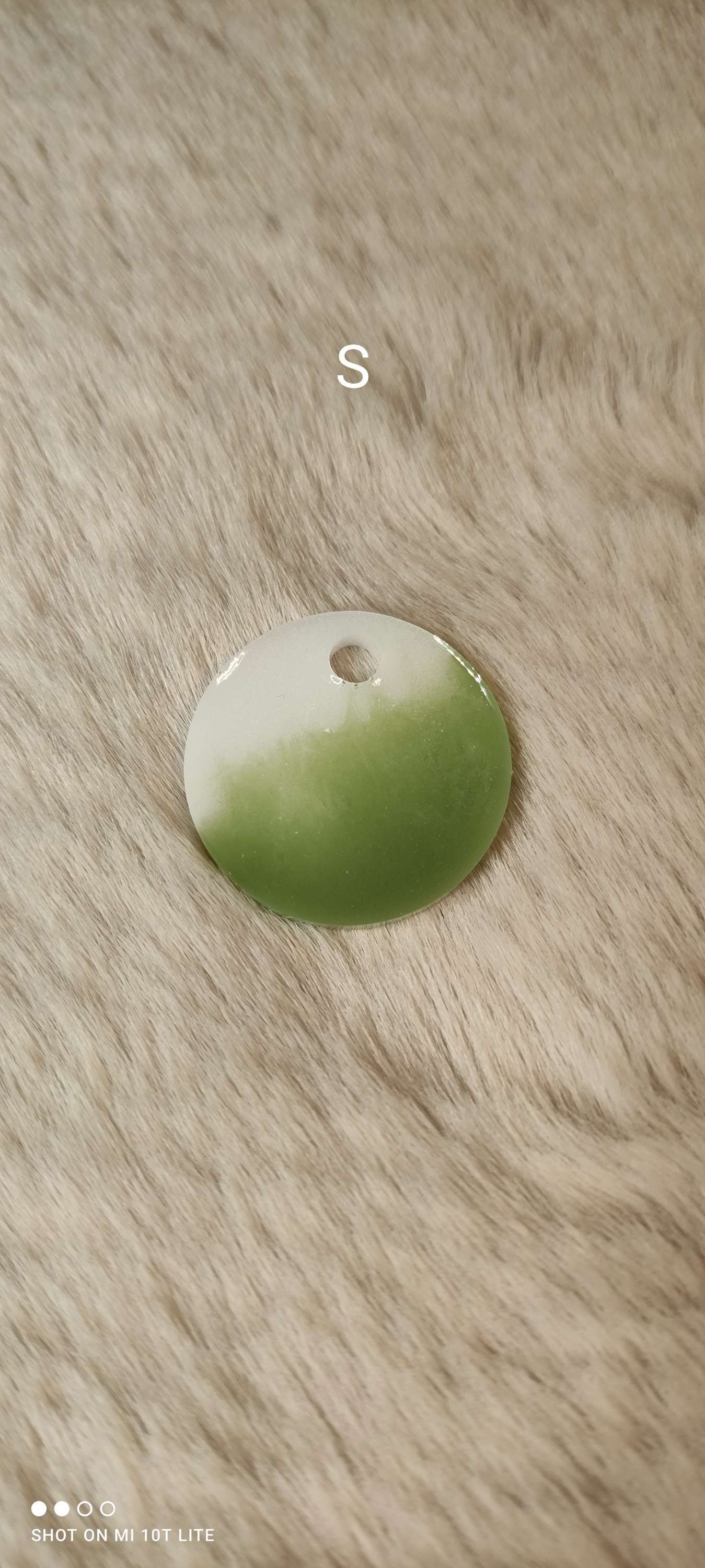 Les médailles "bicolores" vert olive et blanc