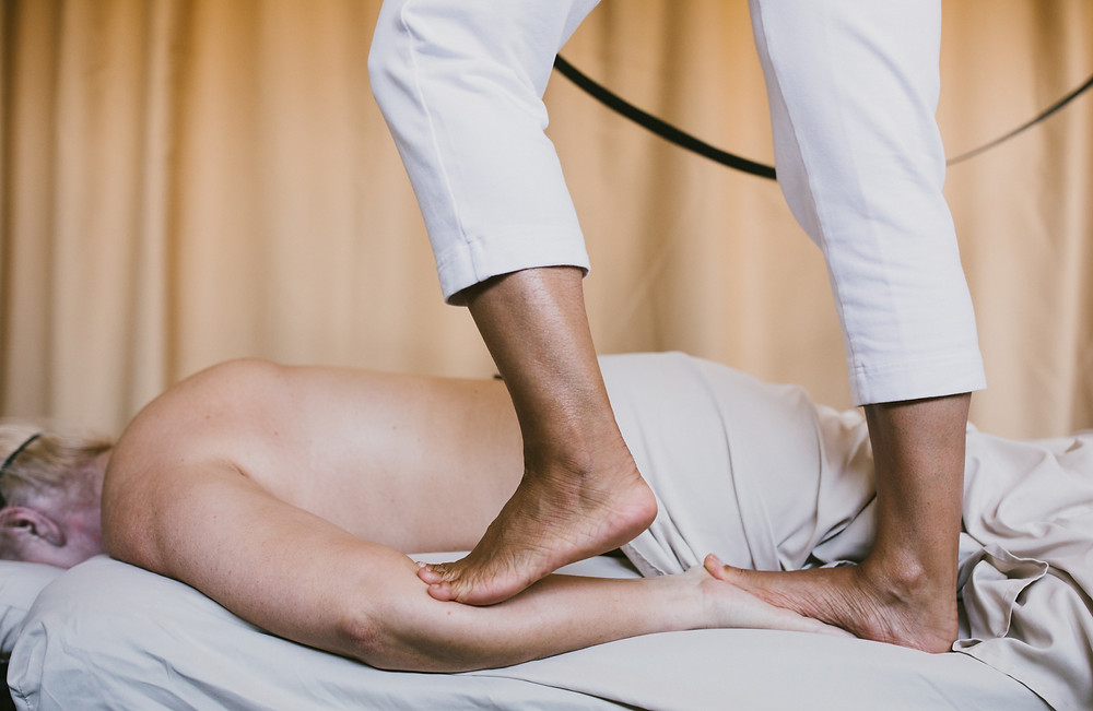 What is Ashiatsu Massage? Info featured by top ashiatsu training center, NC AShiatsu Barefoot Massage Training