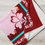 Thumbnail: Folded beautiful pink blanket designed with Biblical inscription