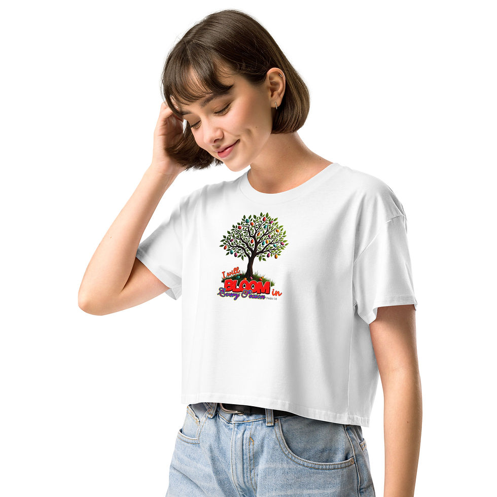 Thumbnail: Front view of a lady with hand on her hair wearing white women's crop top t-shirt for sale online at gracefultshirts.com