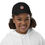 Thumbnail: Front view of a smiling girl wearing a black embroidered Santa Claus cap for sale online at gracefultshirts.com