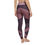 Thumbnail: Back view of a lady wearing a brown yoga leggings with special designs with both legs together