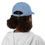 Thumbnail: Back view of a girl wearing a light blue embroidered Santa Claus cap for sale online at gracefultshirts.com