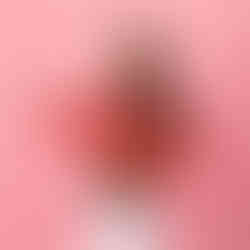 A young girl wearing an All-over-print Christmas rash vest