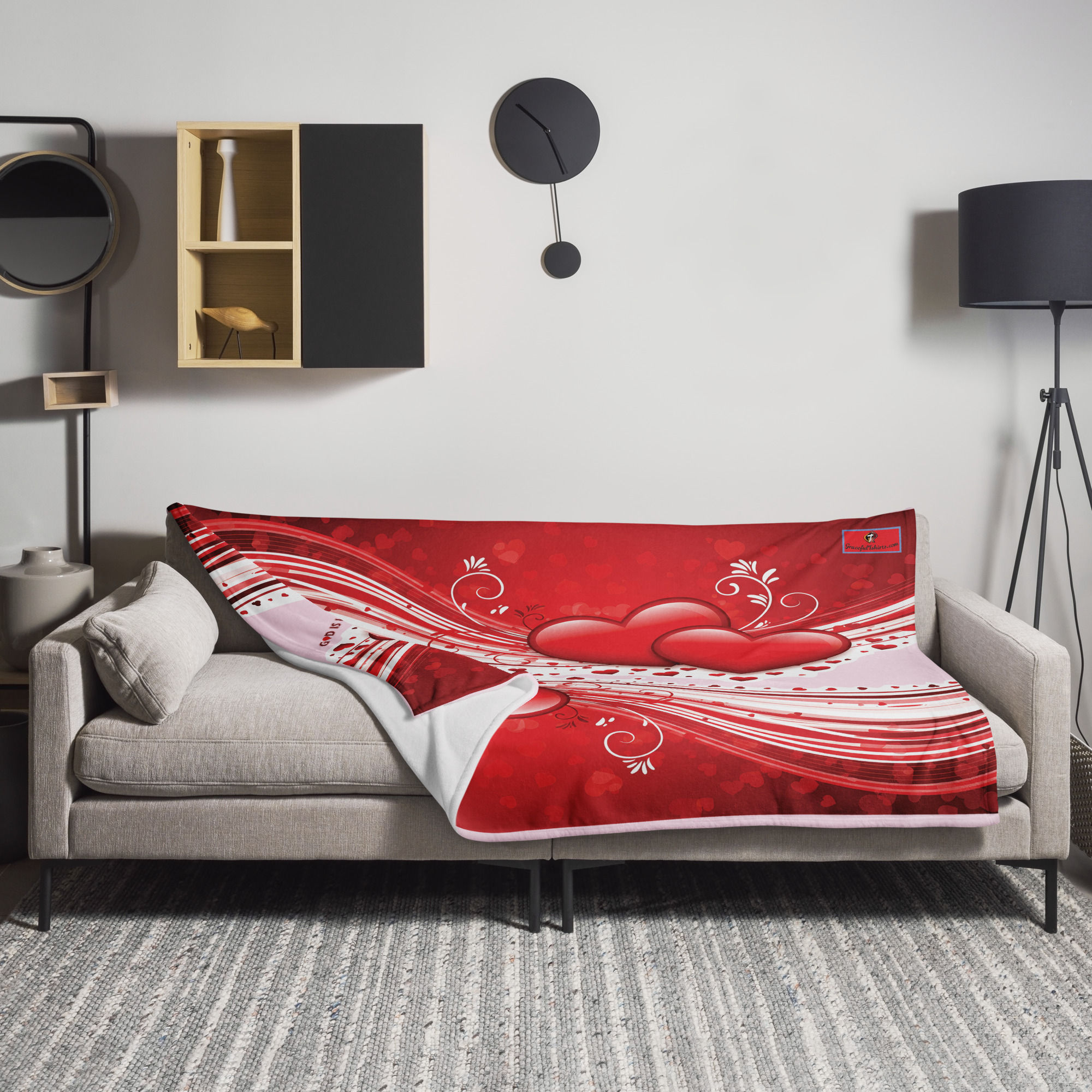 A 60 x 80 inch valentines throw blanket placed on a couch