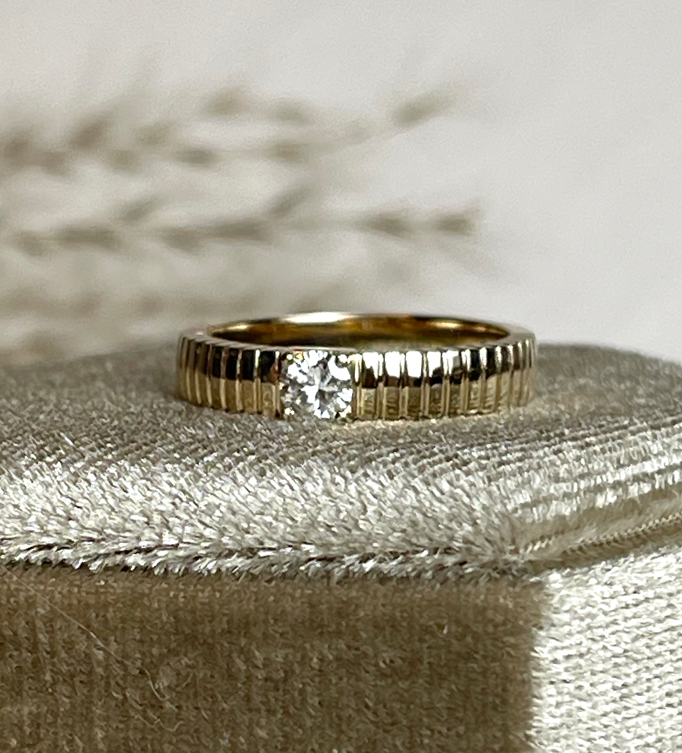 Thumbnail: CUSTOM MADE GRADUATING STATEMENT RING WITH ROUND CUT CENTER