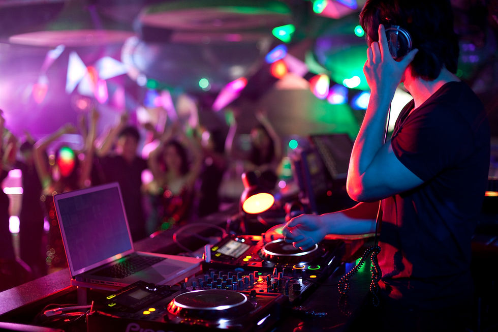 dj-doing-record-scratching-in-nightclub-2023-11-27-05-14-28-utc.jpg