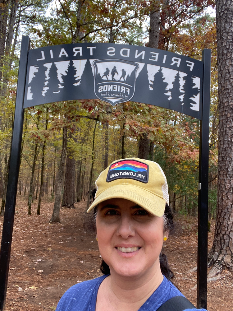 The author in front of the Friends Trail Loop Trailhead