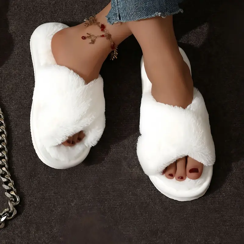 Thumbnail: The Cozy Cross Fur Slipper