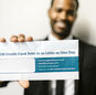 African American man holding envelope emphasizing credit card debt relief options.