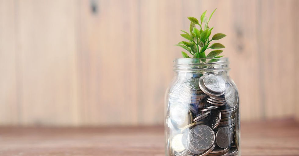 A jar filled with coins and a plant symbolizes growth in savings and investment.