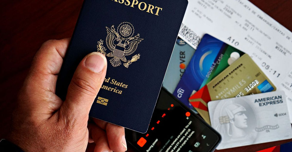 Build Credit on a Work Visa - US passport with credit cards and travel documents on a table, travel preparation concept.