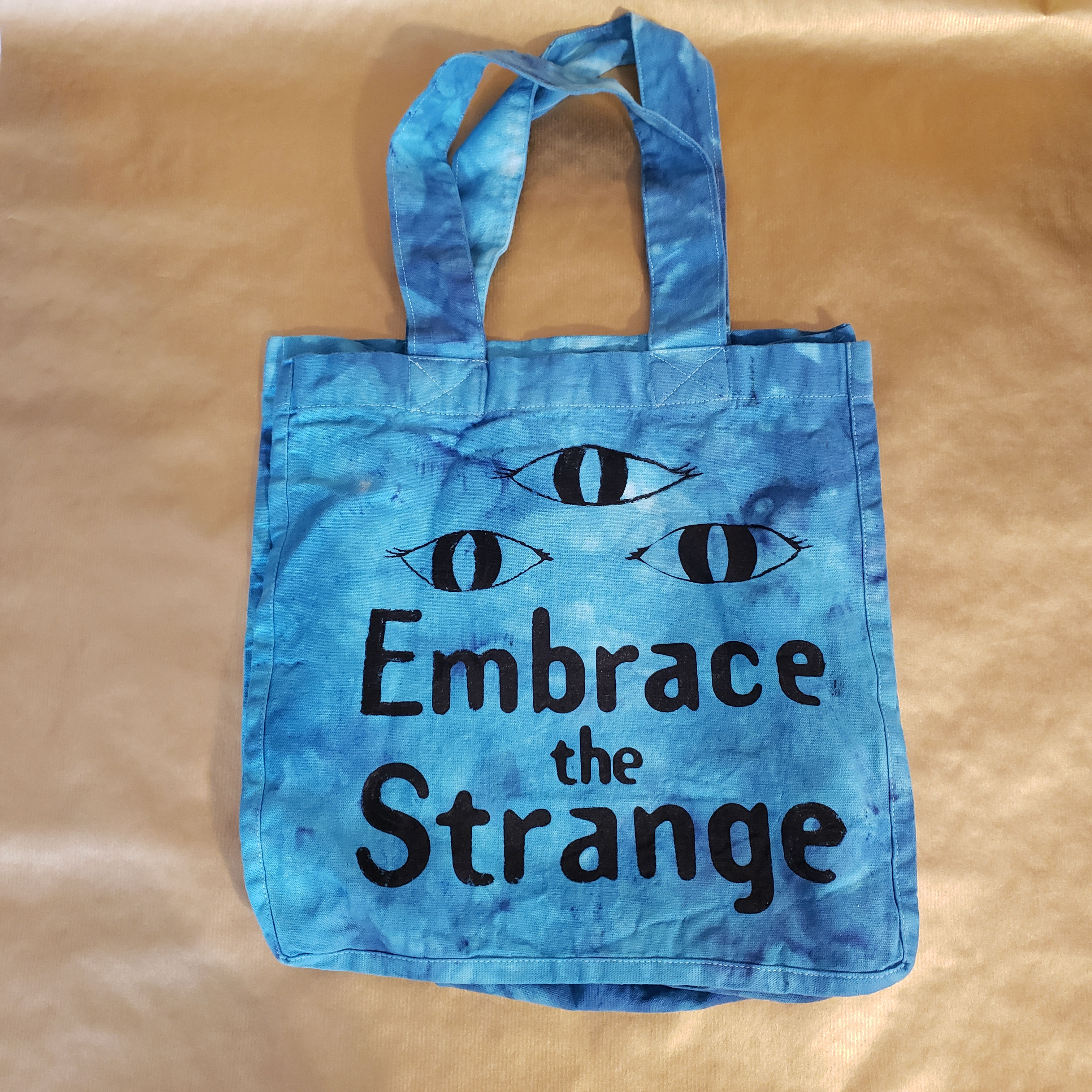 Embrace the Strange Tote Bag