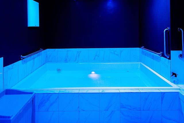 View of a tiled custom float room.