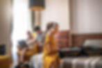 4 Data Safety Tips To Practice While Traveling family in hotel listening on bluetooth