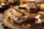 s'mores made from toasted marshmallow, graham crackers and chocolate bars