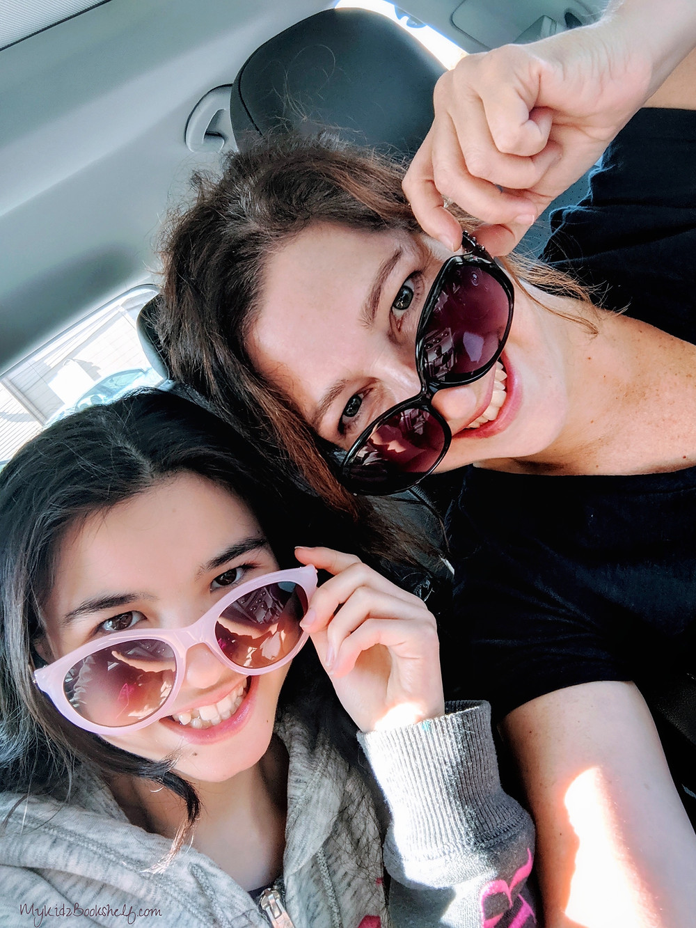 mother-and-daughter-doing -elfie-with-sunglasses