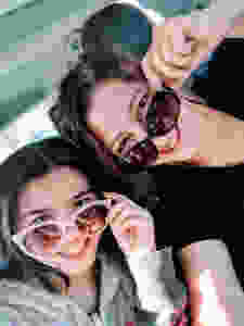 mother-and-daughter-doing -elfie-with-sunglasses