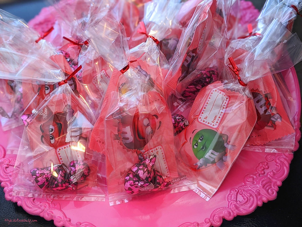 Valentine's Day sweets goodie bags with Hershey's kisses and M & M