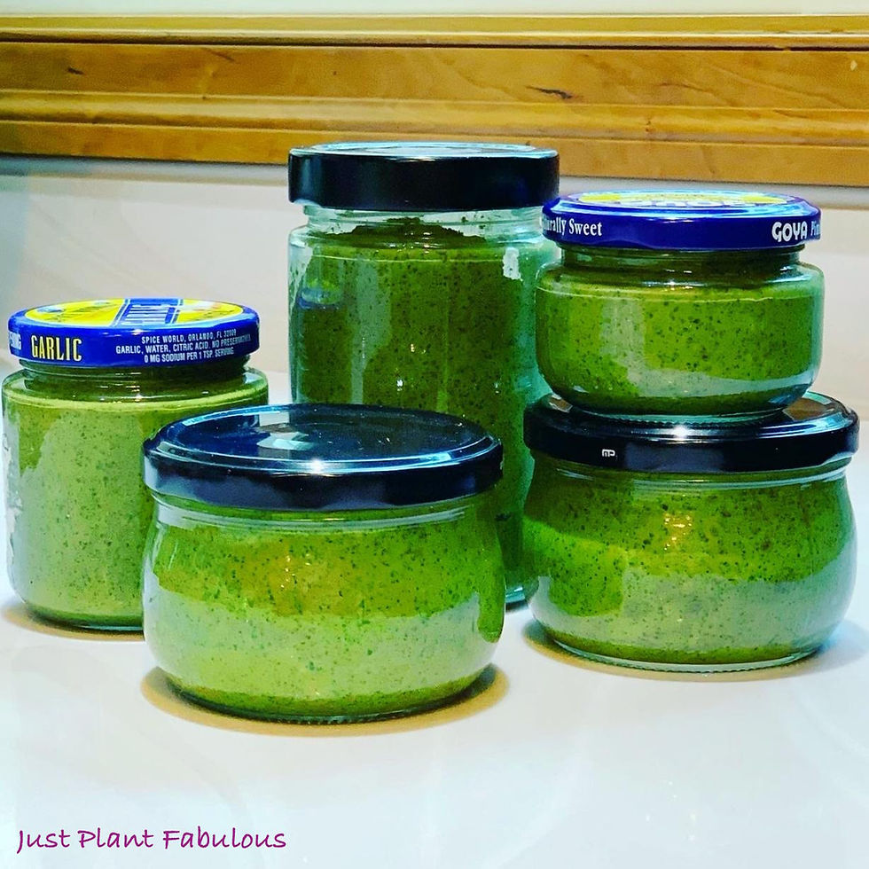jars of basil pesto stacked