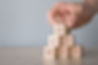 Wooden cubes with smiling faces for customer feedback