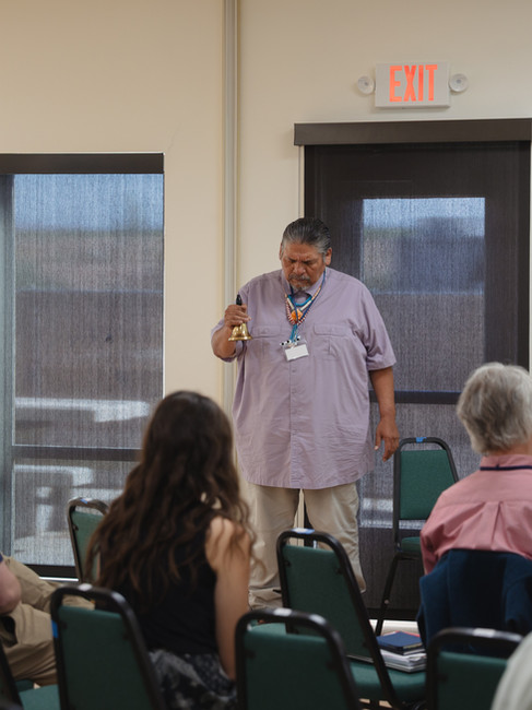 Jason Buck, Wanapum member and CBCD Cultural Resources Specialist, leads a traditional ceremony before lunch.