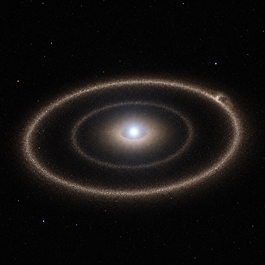 Heller weißbläulicher Stern Fomalhaut im Zentrum eines geneigten mehrteiligen Staubsystems mit schmalem äußerem Ring, schwächerem Zwischenring und diffuser innerer Staubscheibe vor schwarzem Weltraum.