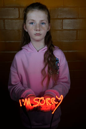 'The artist set up the first meetings unsure of where they would lead, arriving to photograph strangers in the darkness of gardens and outhouses, and leaving the results more or less to chance. The neon sculpture clasped in each person’s hands came to symbolise the fragility of human connection, and the moment of mutual trust in which McCourt handed over this delicate, breakable object in return for their image. She was aware that one clumsy gesture could end the project, had the neon slipped out of their grasp and shattered, but that sense of precariousness only made the moment more precious.'
Orla Foster, Corridor8
