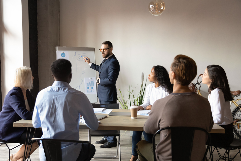 Presenter in business meeting with orange tinted lenses