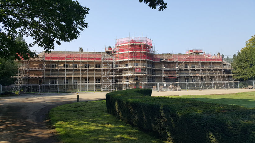Grand hall being renovated covered in scaffolding