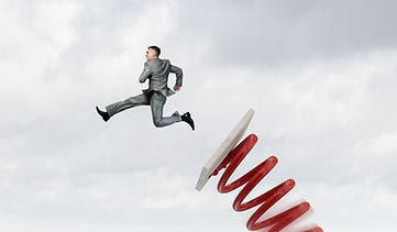 Man being thrown to the top of his career