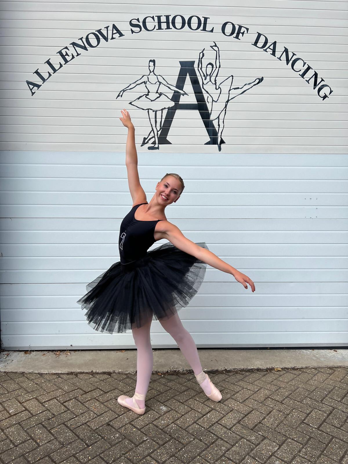 Girl posing in front of Allenova dance studio