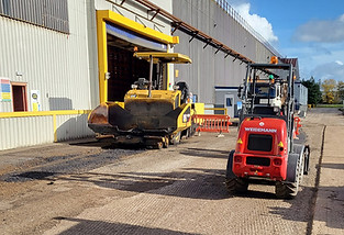large warehouse with road undergoing works