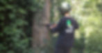 Worker from Trees R Us cutting down a tree
