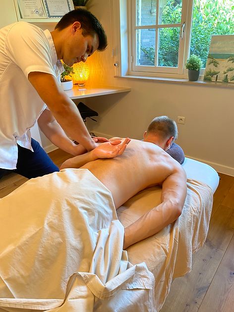 Moving the arm to the back allows easy access to massage under the scapula. Stretching of scapula.