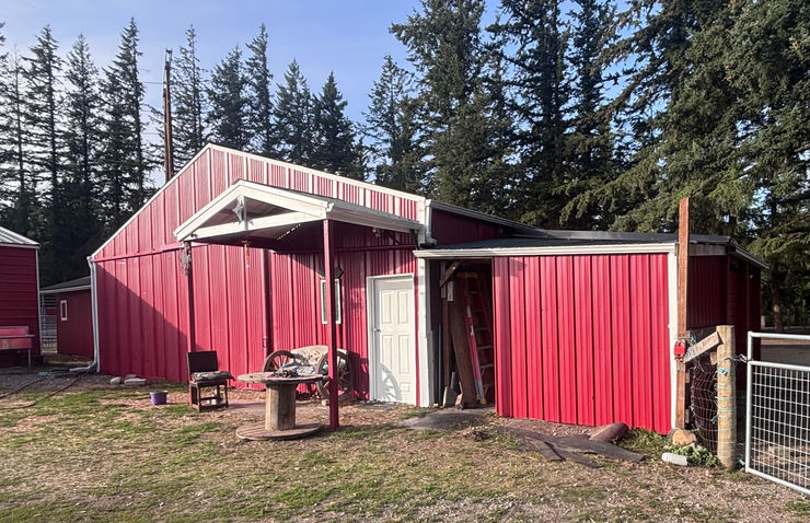 Newly enclosed shavings shed on the right now matches everything else