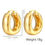 Thumbnail: Close up of thick oval gold hoop earrings