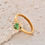 縮圖：Gold Ring with Green Gemstone and Diamond Accents