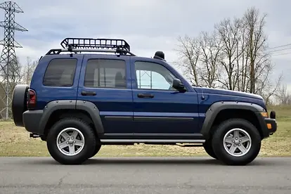 2006-jeep-liberty-side-view-blue_1024x1024.webp