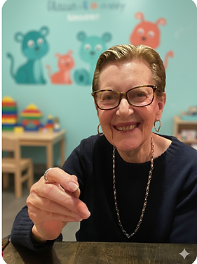 Portrait of Gynny Held, a Speech-Language Pathologist providing pediatric speech therapy services for kids in North York.