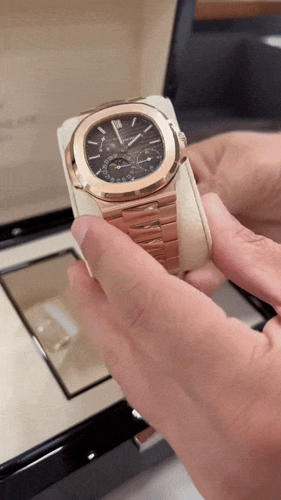 1R-001 Nautilus Moon Phase in Rose Gold with Sunburst Dial Unboxing (1).gif