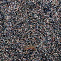 A deep brown granite with red, black, and earthy flecks, offering a warm, naturally textured character.